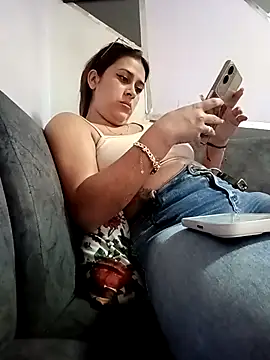 maribelle1 (F young) - Shows boobs with lotion