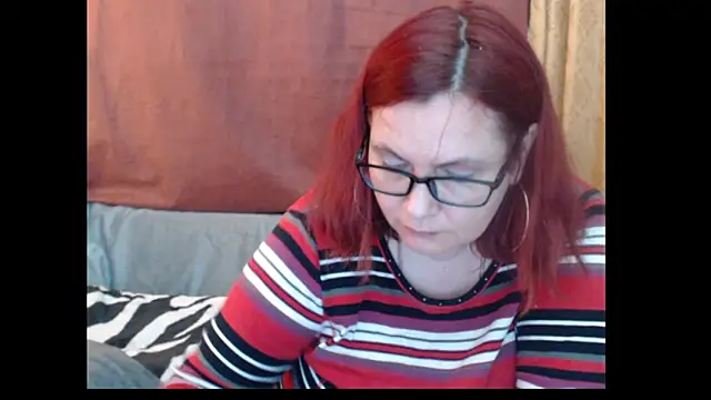 PlayfullMature webcam