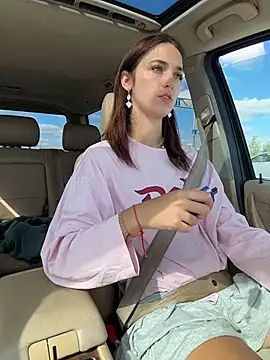 dollytall (F young) - Topless under jacket in car mid parking