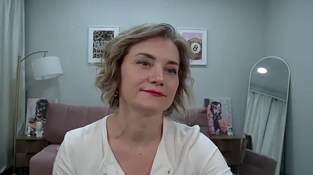 AdeleRocher blonde MILF cam girl